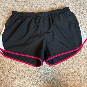 Nike dry-fit athletic running shorts. size women’s xl. black , pink and white.